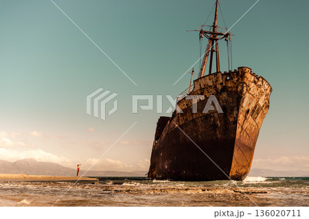 Tourist woman on beach enjoying vacation 136020711