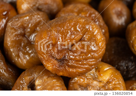 Macro shot of organic sun-dried figs, detailed view. Macro shot of organic sun-dried figs, detailed view. 136020854