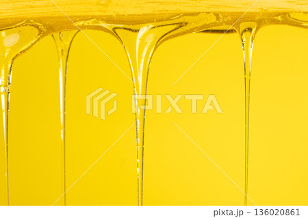 Abstract yellow background with viscous honey texture. 136020861