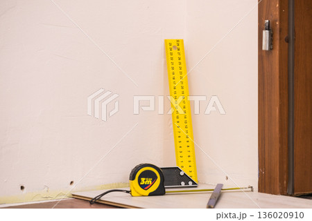 Renovations tools, tape measure, industrial ruler Renovations tools, tape measure, industrial ruler 136020910