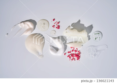 Skincare cosmetic products swatches showcasing various textures and ingredients Skincare cosmetic products swatches showcasing various textures and ingredients 136021143
