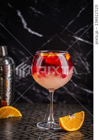 Glass of red wine spanish cocktail 136022520