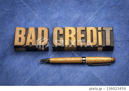bad credit word abstract in wood type, financial concept bad credit word abstract in wood type, financial concept 136023459