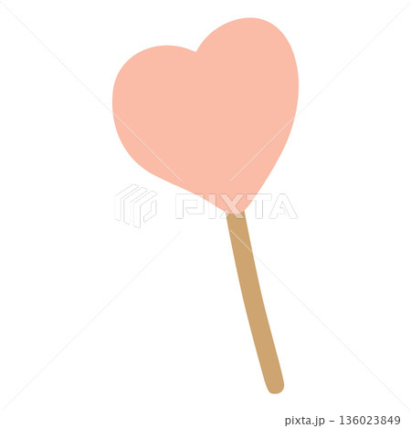 Pink heart lollipop on a stick for sweetness and love 136023849