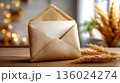 Elegant Golden Envelope with Blank Card and Pampas Grass - Warm Festive Ambiance 136024274