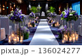 Elegant Purple Wedding Aisle Decor with Tall Floral Arrangements and Glowing Candles 136024277