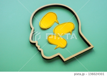 Overthinking inside human head with speech bubbles. Mental overload. Overthinking inside human head with speech bubbles. Mental overload. 136024301