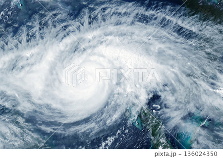 Hurricane from space. Atmospheric cyclone. Elements of this image furnished by NASA Hurricane from space. Atmospheric cyclone. Elements of this image furnished by NASA 136024350
