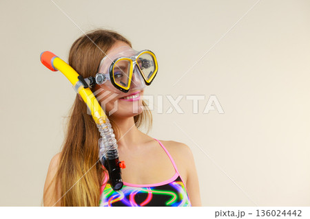 Woman with snorkeling mask having fun 136024442