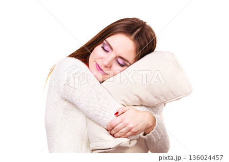 Girl relaxing on pillow. 136024457