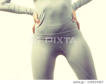 Female hips wearing thermoactive underwear 136024467