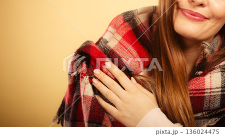 Woman wearing woolen checked scarf warm autumn clothing Woman wearing woolen checked scarf warm autumn clothing 136024475