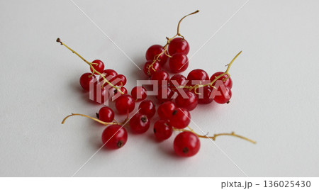 Bunches Of Juicy Redcurrants Isolated On White Surface Stock Photo Bunches Of Juicy Redcurrants Isolated On White Surface Stock Photo 136025430