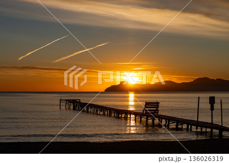 Wooden pier on Muro Beach at sunrise, Playa de Muro, Mallorca, Balearic Islands, Spain, Europe 136026319