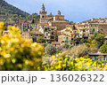Panoramic view of the mountain village of Valldemossa with church Sant Bartomeu in Serra de Tramuntana mountains, Mallorca, Balearic Islands, Spain 136026322