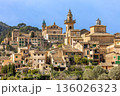 Mountain village of Valldemossa with Royal Charterhouse and church Sant Bartomeu in Serra de Tramuntana mountains, Mallorca, Balearic Islands, Spain 136026323