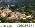 Panoramic view of the mountain village of Valldemossa with church Sant Bartomeu in Serra de Tramuntana mountains, Mallorca, Balearic Islands, Spain 136026324