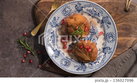 Rabanadas poveiras with sugar and cinnamon Rabanadas poveiras with sugar and cinnamon 136027096