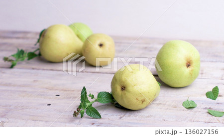 Pears on wooden table Pears on wooden table 136027156