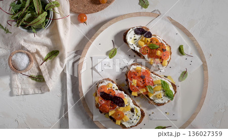 Italian bruschetta with roasted tomatoes 136027359