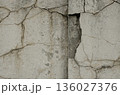 Damaged concrete steps outdoors showing cracks and holes 136027376
