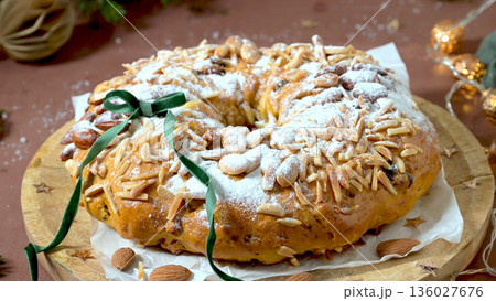 Traditional Portuguese Bolo Rainha Christmas Cake with Toasted Almonds and Powdered Sugar 136027676