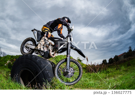 Enduro bike rider Enduro bike rider 136027775