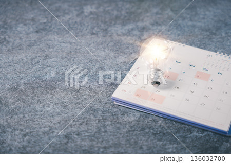 light bulb career idea concept business target innovation and growth rests on white calendar page, visualizing monthly schedule for professional concept collage of career success light bulb career idea concept business target innovation and growth rests on white calendar page, visualizing monthly schedule for professional concept collage of career success 136032700
