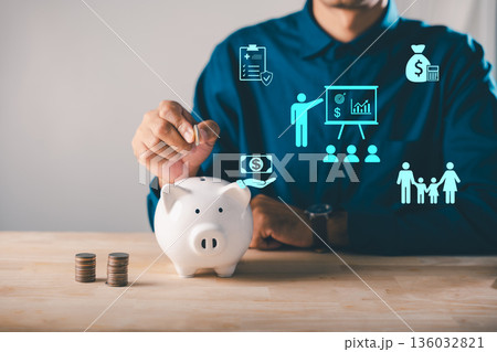 Person putting coin into piggy bank shows economy, money, bank, piggy, finance, global, stock, growth, business, concept, save, invest, economic impact on family savings Person putting coin into piggy bank shows economy, money, bank, piggy, finance, global, stock, growth, business, concept, save, invest, economic impact on family savings 136032821