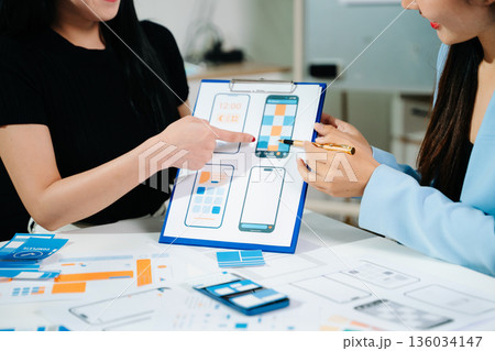 UX graphic designer planning application process development prototype wireframe for web smart phone. Creative digital development agency. UX graphic designer planning application process development prototype wireframe for web smart phone. Creative digital development agency. 136034147