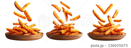 Set of Kumara sweet potato fries with black pepper and herbs on wooden plate, on white, concept of New Zealand fast food snack 136035073