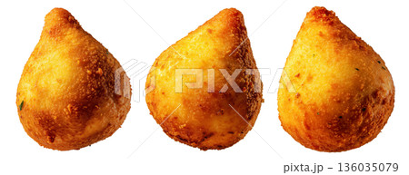 Fried Brazilian coxinhas cone snack filled shredded chicken cheese with golden crispy texture isolated on white background Fried Brazilian coxinhas cone snack filled shredded chicken cheese with golden crispy texture isolated on white background 136035079