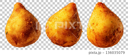 Fried Brazilian coxinhas cone snack filled shredded chicken cheese with golden crispy texture isolated on white background Fried Brazilian coxinhas cone snack filled shredded chicken cheese with golden crispy texture isolated on white background 136035079