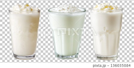 Ayran salted yogurt drink in tall glass with foamy top and mint leaf, isolated on white background, concept of healthy drink Ayran salted yogurt drink in tall glass with foamy top and mint leaf, isolated on white background, concept of healthy drink 136035084