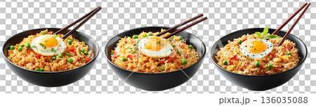 Spicy fried rice Nasi Goreng garnished with fresh green onions and topped with fried egg in bowl, isolated on white Spicy fried rice Nasi Goreng garnished with fresh green onions and topped with fried egg in bowl, isolated on white 136035088