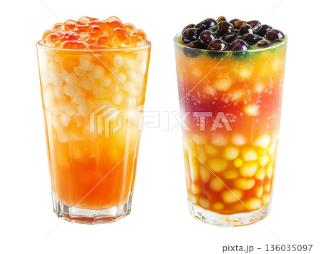 Orange bubble tea Filipino Sagot Gulaman filled with tapioca pearls and topped with mint, isolated on white background. Orange bubble tea Filipino Sagot Gulaman filled with tapioca pearls and topped with mint, isolated on white background. 136035097