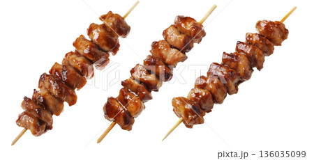 Grilled chicken yakitori skewer with teriyaki glaze or Isaw Filipino street food isolated on white transparent background 136035099