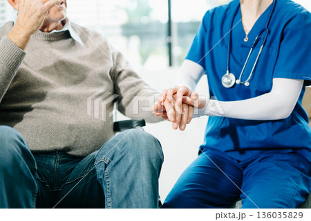 ng hands takFemale hands touching old male hand Helpie care of the elderly concept. ng hands takFemale hands touching old male hand Helpie care of the elderly concept. 136035829