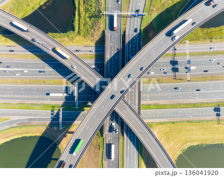 Modern urban infrastructure, road junction, and city transportation system from above.  136041920