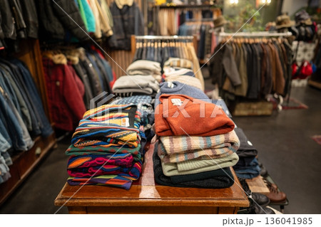 Vintage men's clothing store interior with different kinds of apparel and accessories on display. 136041985