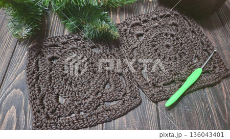 A crochet pattern of brown squares, perfect for home decor and fashion. Pattern. 136043401