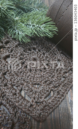 A crochet pattern of brown squares, perfect for home decor and fashion. Pattern. 136043403