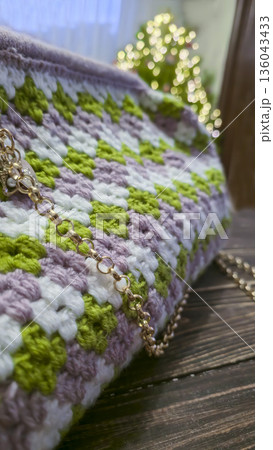 A colorful knitted fabric texture suitable for home decor, fashion, or textile A colorful knitted fabric texture suitable for home decor, fashion, or textile 136043433