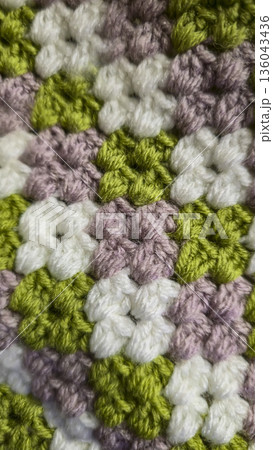 A colorful knitted fabric texture suitable for home decor, fashion, or textile A colorful knitted fabric texture suitable for home decor, fashion, or textile 136043436