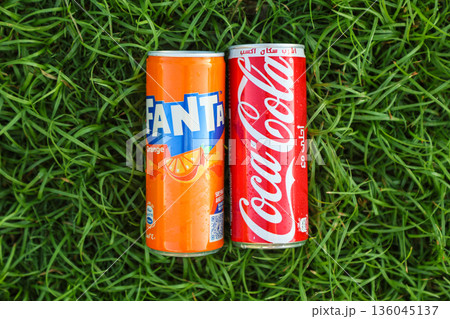 Egypt, Sharm El Sheikh - September 27, 2025 Two cans of popular carbonated drinks Coca-Cola and Fanta on a beautiful summer background. Editorial Egypt, Sharm El Sheikh - September 27, 2025 Two cans of popular carbonated drinks Coca-Cola and Fanta on a beautiful summer background. Editorial 136045137