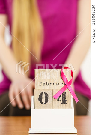 Woman and world breast cancer day on calendar Woman and world breast cancer day on calendar 136045234