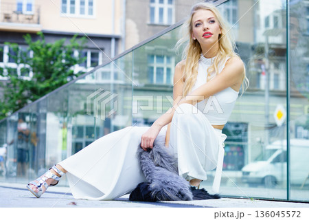 Woman wearing crop top and culottes 136045572