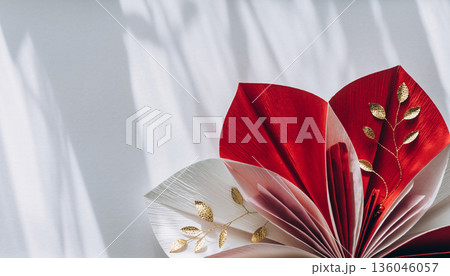 正月・成人式のイメージ：紅白の和装小物と柔らかな木漏れ日の背景 136046057