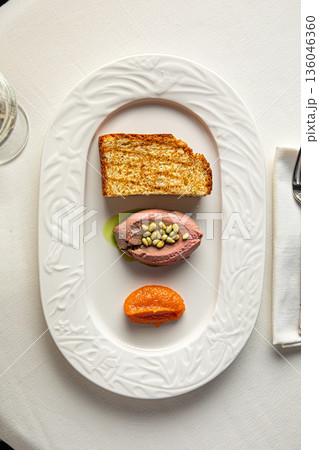 Liver pate appetizer with toast and garnish Liver pate appetizer with toast and garnish 136046360