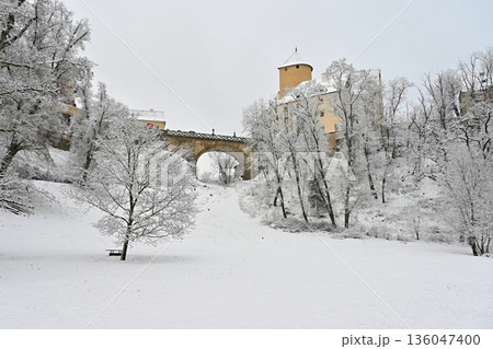 The beautiful old castle of Veveri Brno, Czech Republic. Winter landscape with snow and nature surrounding the castle. The beautiful old castle of Veveri Brno, Czech Republic. Winter landscape with snow and nature surrounding the castle. 136047400